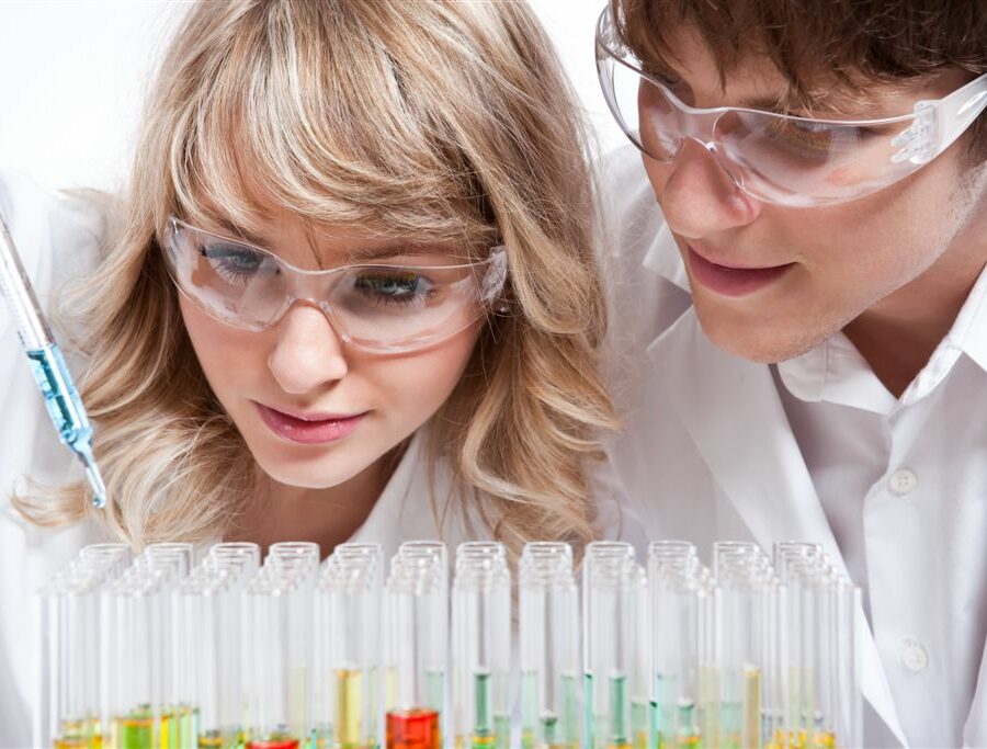 A shot of a male and female caucasian scientists